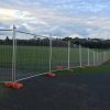 Australia temporary fence is placed between the lawn and the road