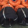 Two rolls of black annealed wires are packed with bundle and several packed with woven bags