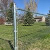 The chain link fence is used to set boundaries for gardens