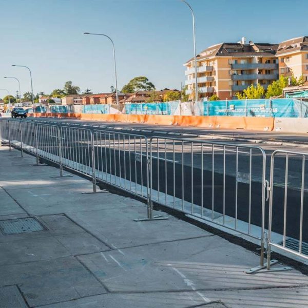 Crowd control barrier is set along the highway for traffic control.