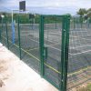 Double wire fence is used to create boundaries for basketball court